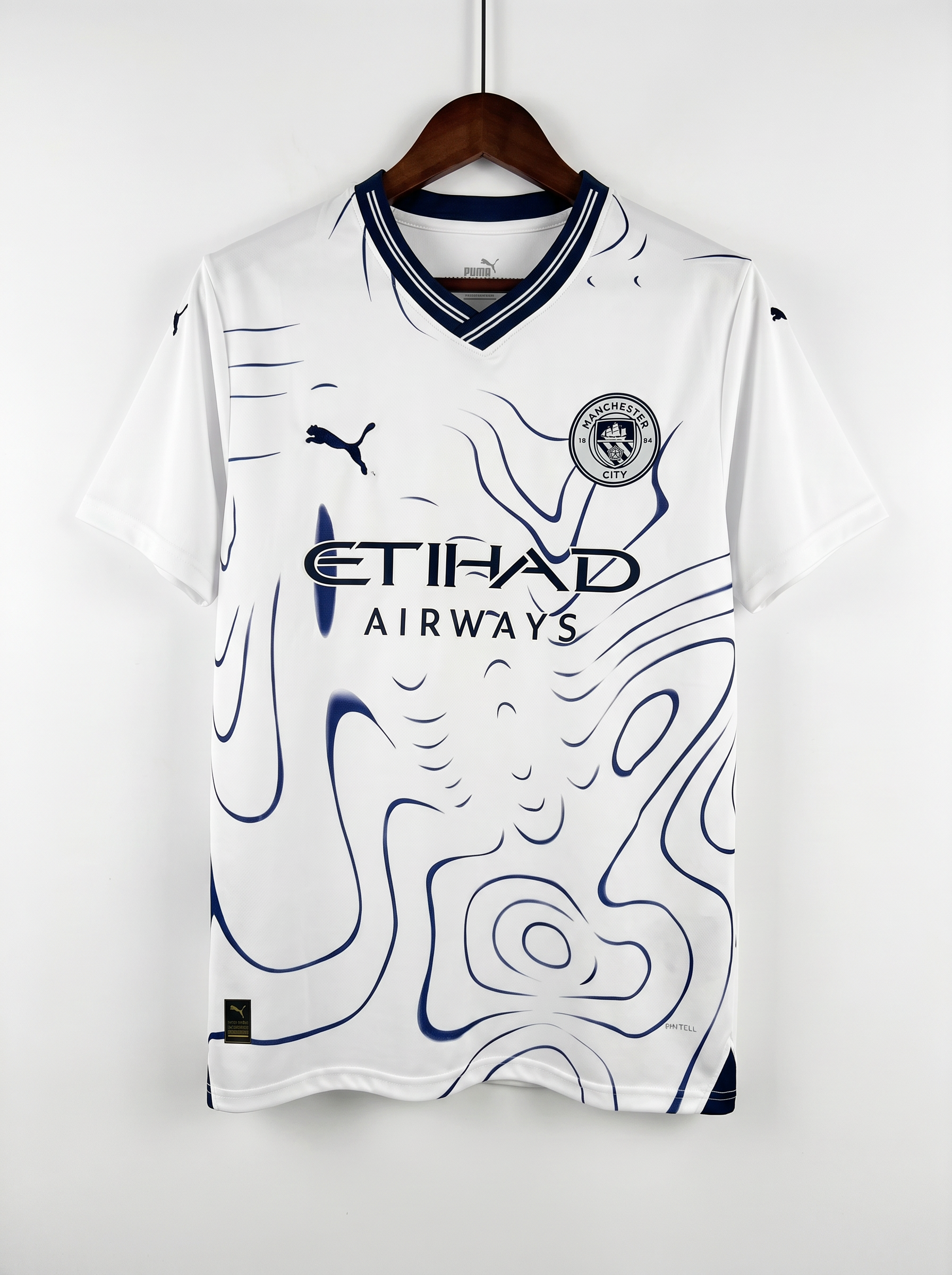 Manchester City  Away – White / Maroon